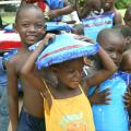 Fighting Malaria with Bednets and Smiles