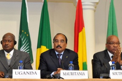 President Jacob Zuma of South Africa, right, hosted a meeting of the African Union Ad Hoc High Level Committee on Libya. President Yoweri Museveni of Uganda is on the left.