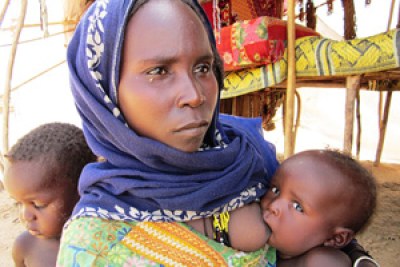 A woman and her children in western Chad, where malnutrition rates often surpass the international emergency threshold.