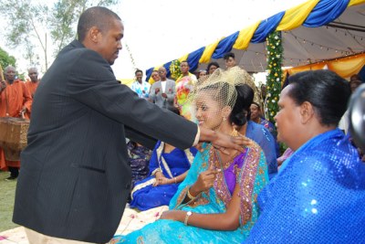 Princess Komuntale with her fiance in a traditional wedding.