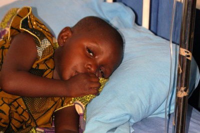 Child receiving treatment for malaria (file photo).
