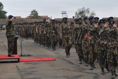 Kenya Defence Forces troops from Somalia salute the Army Commander Lt Gen Joseph  Kasaon during the Reception Parade for Operation Linda Nchi Troops in Langata Barracks.