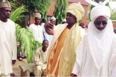 The New Emir of Kano, Sanusi Lamido Sanusi, right, and others during his arrival at the Emirate of Kano.