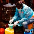 Red Cross and Community Volunteers Meet with Residents to Spread Ebola Prevention Awareness Across West Africa