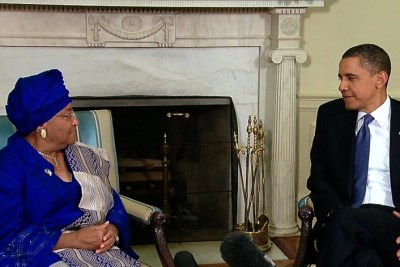 President Obama Meets with Liberian President Johnson Sirleaf in the Oval Office in May 2010.