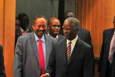 Former South African President Thabo Mbeki, chairs of the High Level Panel on Illicit Flows, and the panel vice-chair. Abdalla Hamdok, Deputy Executive Secretary of the UN Economic Commission for Africa (ECA), arriving at the ECA to present the panel's report .