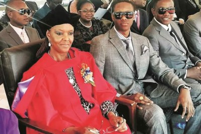 The Mugabes: From left First Lady Grace and her two sons, Robert Jr and Bellarmine Chatunga.