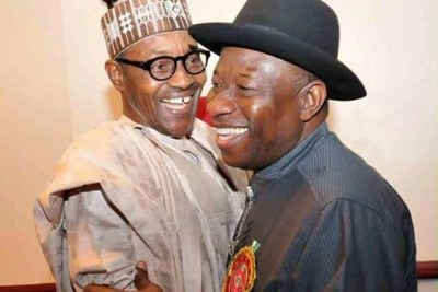 President Goodluck Jonathan and General Muhammadu Buhari in a warm embrace at the 2015 Elections Sensitization Workshop on Non-Violence in Abuja.