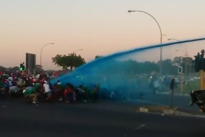 Police fired water cannons and stun grenades at protesters outside the University of the Western Cape in Cape Town.
