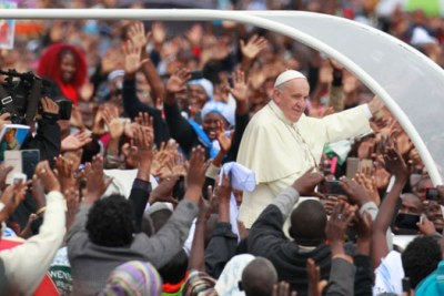 Pope Francis arrives at the University of Nairobi grounds for the papal mass.