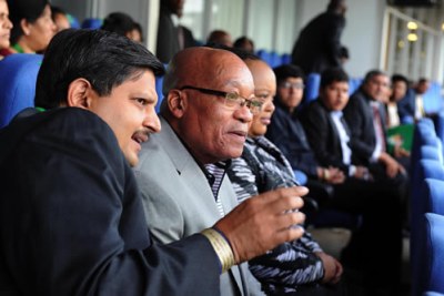 President Jacob Zuma, right, and Atul Gupta.