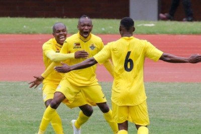 Zimbabwe Warriors striker Khama Billiat celebrates with team mates after scoring (file photo).