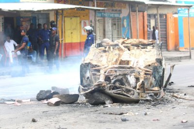 A burnt vehicle in Kinshasa (file photo).