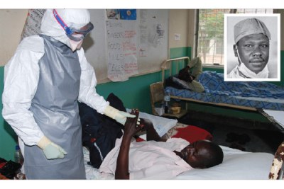 A medical officer attends to a suspected ebola patient. Dr Mathew Lukwiya (inset) died of ebola when the disease first broke out in 2000.