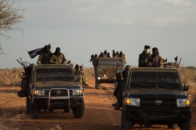 Al-Shabaab in vehicles taken from the military