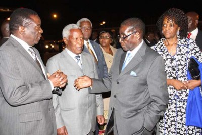 From left, Vice President Emmerson Mnangagwa, Defence Minister Sydney Sekeramai, President Robert Mugabe, and First Lady Grace Mugabe.