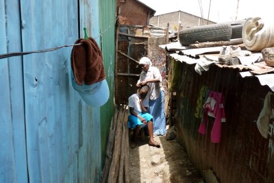 Ann-Sophia ekes out a living by hairdressing.