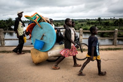 Congolese family fleeing ethnic violence in Kamonia, Kasai province