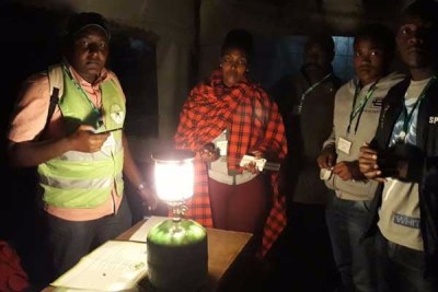 Independent Electoral and Boundaries Commission officials get ready for the day at Municipal Park in Naivasha (file photo).