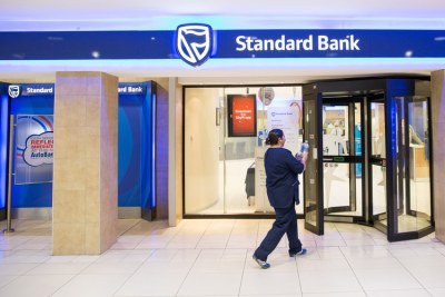 A customer enters a Standard Bank branch (file photo).