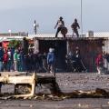 Photo Essay - Running Battles Over Land Occupation in Vrygrond, Cape Town