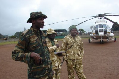 KWS officials in Njabini wait for the weather to clear before they embark on search and rescue mission for the missing aircraft.