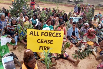 Women protest in Bamenda, Cameroon, in response to a Sept. 3, 2018, attack on the local Presbyterian School of Science and Technology, where six students were abducted.