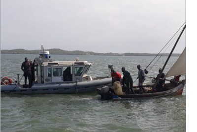 Kenya Navy officers rescuing fishermen whose dhows capsized at Mlango wa Bomani in Kiunga, Lamu  East (file photo).