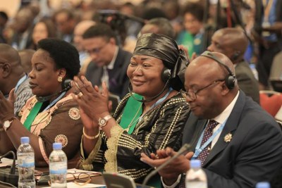 MPs follow proceedings during a session of the Fifth Pan-African Parliament at Kigali Convention Centre.