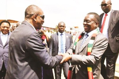 President Emmerson Mnangagwa is welcomed by Guinea President Alpha Condé on arrival at Airport Conakry Gbessia.