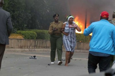 Police rescue people from the Dusit hotel complex on January 15, 2019 following an attack by suspected terrorists.