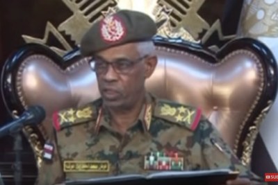 Defence Minister Awad Ibn Ouf speaking on state television.