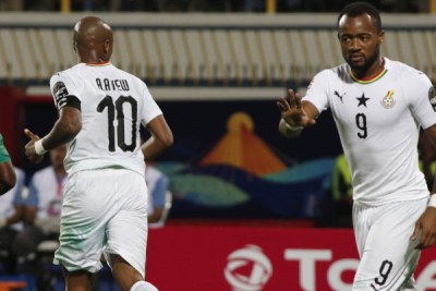 Jordan Ayew, right, gestures to his sibling and Ghana captain Andre Ayew (file photo).