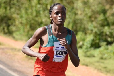 Brigid Kosgei on her way to victory during the Kalya Half Marathon in West Pokot County on December 08, 2018.