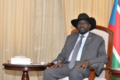 Sudanese Prime Minister Abdallah Hamdouk, left, is received by South Sudan President Salva Kiir at in the State House in Juba on September 12, 2019.