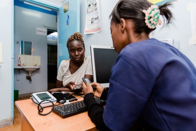 A nurse provides healthcare service (file photo). .