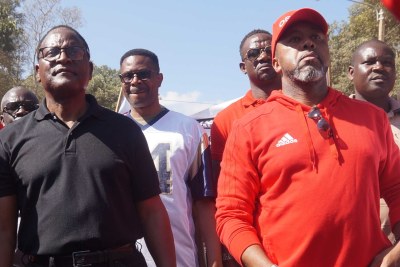 MCP leader Lazarous Chakwera (in black) and UTM leader Saulos Chilima (in red) were also taking part in protests against last May election results (file photo).