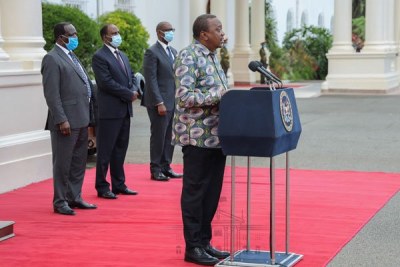 President Uhuru Kenyatta addresses the country on the Covid-19 disease from State House (file photo).