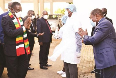 President Emmerson Mnangagwa and his Mozambican counterpart President Filipe Nyusi exchange greetings in Chimoio, Mozambique.