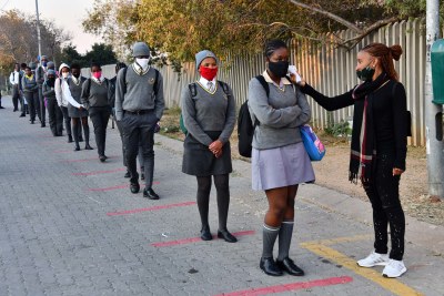Learners are screened for Covid-19 (file photo).