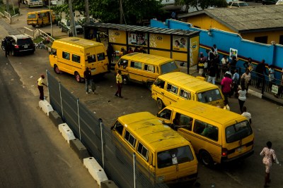 The pedestrian bridge at Alapere, Lagos. It documents the busy city of Lagos.