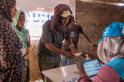 Ethiopian refugees register with UNHCR at Um Rakuba camp in Al Qadarif state, Sudan, after fleeing their home.