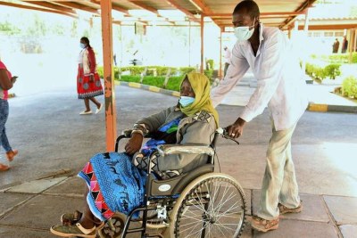 Susan Liaman is wheeled out of hospital after failing to get medical services at Nakuru Level Five Hospital on December 21, 2020.