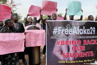 Parents protest against the kidnapping of their children from a college in Nigeria - 29 were eventually freed by the gunmen, Nigerian authorities said. The kidnappers had demanded ransom in a graphic video, but the parents' group would not say how much was paid.