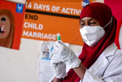 A health worker prepares a Covid-19 vaccine at a hospital in Mogadishu (file photo)