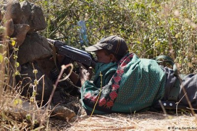 An armed member of a local militia watches the hills for Tigrayan fighters (file photo).
