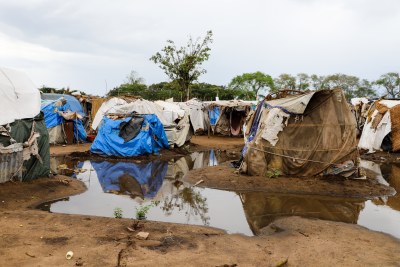 Makeshift tents surrounded by water at Kigaramango IDP camp. Displaced persons have been living in this camp since the floods in Gatumba in April 2020. This camp has been completely flooded in May 2021 and people who were still living there were displaced to another site.