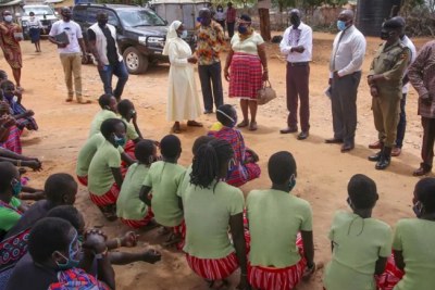 District leaders speak with girls at Kalas primary school in Uganda (file photo).