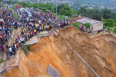 A road destroyed in flooding in Kinshasa on December 13, 2022.