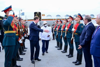Ugandan President Yoweri Museveni, in white shirt, arriving at Pukolvo Airport in St Petersburg, Russia for the Russia-Africa Summit 2023